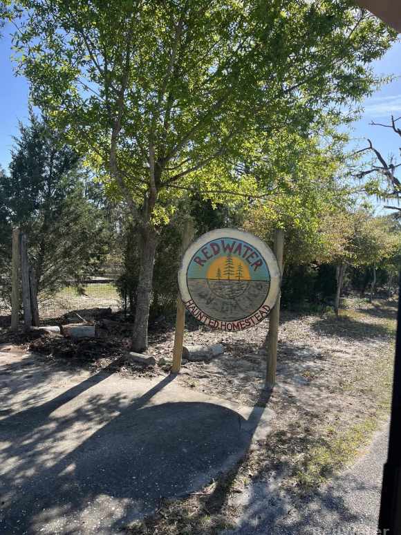 The sign marking the entrance to the homestead.